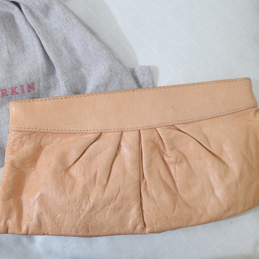 Brand new Laura Merkin tan clutch